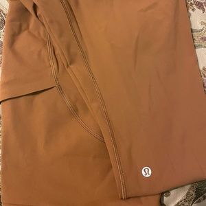Leggings from Lululemon high rise side pocket emblem on leg.